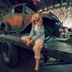 Nighttime Serenity: Woman’s solitude on a utility trailer