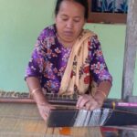 হস্ততাঁত ও হস্তকারু শিল্পে অসামান্য কৃতিত্বের জন্য ২০২৩ সালে জাতীয় হস্ততাঁত সম্মানে ভূষিত বিশিষ্ট তাঁতশিল্পী নির্মলা সিনহা