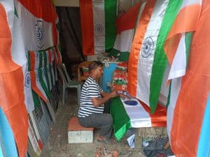 প্রতিবছরের মতো এবারও জাতীয় পতাকা তৈরিতে ব্যস্ত ধর্মনগরের ব্যবসায়ী রূপম রায়