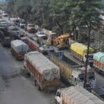 ধর্মনগর জাতীয় সড়কে তল্লাশির জটিলতায় লরি চালকদের অবরোধ, দীর্ঘ যানজট